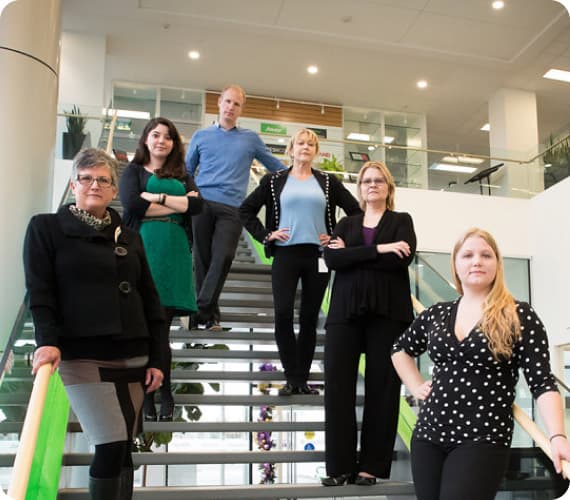 A group of people standing on stairs